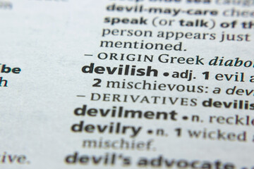 Word or phrase Devilish in a dictionary.