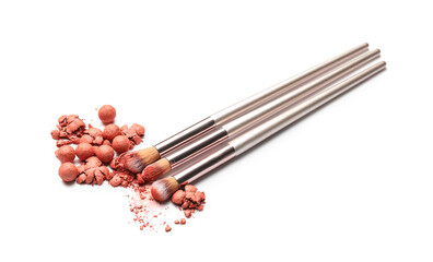 Set of makeup brushes with powder pearls on white background