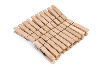Set of wooden clothespins on a white background