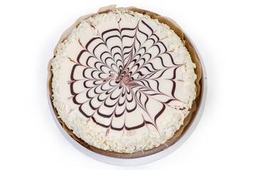 White and milk chocolate decoration of the round cake