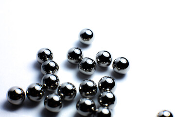 Small metal balls close up photo.