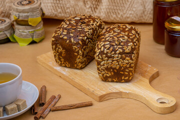 Grain baked brean on wooden board 