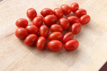 Cherry Tomatoes on a wooden chopping board