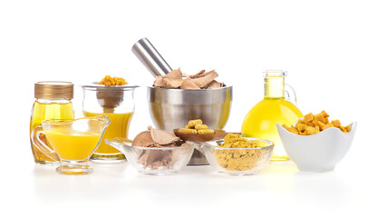 
Phlai or Zingiber montanum dried slice and powder placed isolated on a white background.