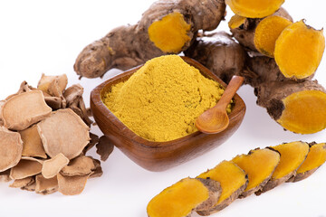 
Phlai or Zingiber montanum dried slice and powder placed isolated on a white background.