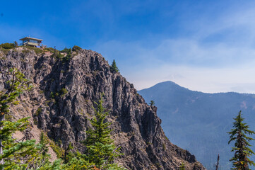 Fire Lookout and Wildfire Smoke - More than 500,000 acres of burned in wildfires in Oregon during 2017. 

Here, Coffin Mountain Fire Lookout with smoke from wildfires is obscuring Mt Jefferson.