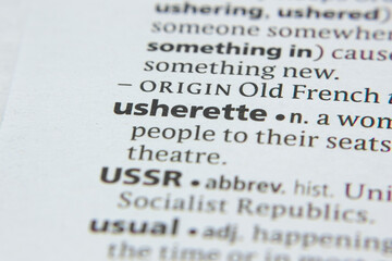 Word or phrase Usherette in a dictionary.