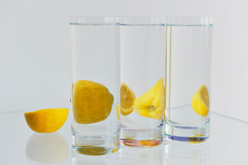 Reflections on glass and water. Art and concept. Lemon reflections