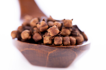 Dried clove flowers isolated on a white background.