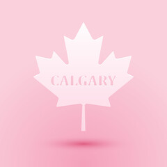 Obraz na płótnie Canvas Paper cut Canadian maple leaf with city name Calgary icon isolated on pink background. Paper art style. Vector.