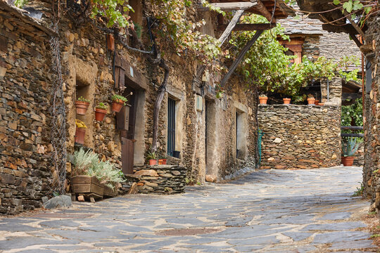 Traditional slate stone village Roblelacasa. Black architecture. Guadalajara. Spain