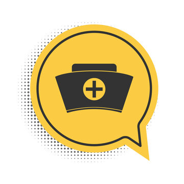 Black Nurse hat with cross icon isolated on white background. Medical nurse cap sign. Yellow speech bubble symbol. Vector.