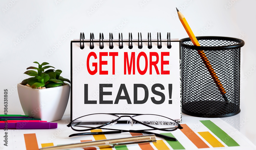 Poster notebook with tools and notes with text get more leads, business