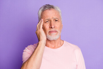 Photo of pensioner grandpa hand head tired look camera wear pink t-shirt isolated violet color background