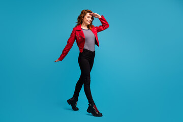Fototapeta na wymiar Full length body size view of nice attractive pretty cheerful cheery fit slim wavy-haired girl going searching opportunity chance future isolated on bright vivid shine vibrant blue color background