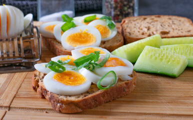 Fototapeta na wymiar Bread with boiled sliced eggs