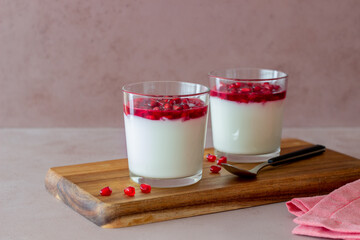 Italian dessert panna cotta with pomegranate. Vegetarian food. Healthy eating. Recipe.