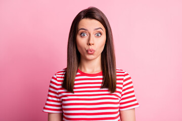 Photo of curious brown hair nice girl wear striped red white cloth isolated over pastel pink color background