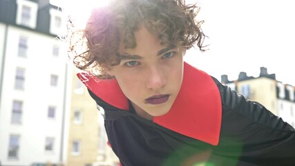 Portrait of a teenage boy in a vampire costume. Halloween.