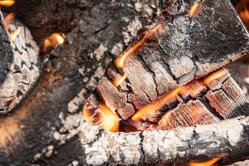 Background from burning logs and branches. Close up.