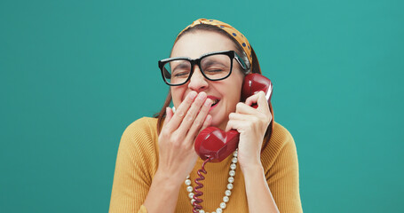 Happy vintage style woman laughing on the phone