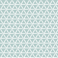 Geometric pattern with blue and white triangles. Geometric modern ornament. Seamless abstract background