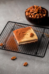 No bake eco-friendly pecan cake on metal mesh tray