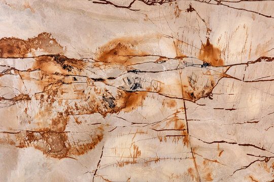 Roma Imperiale - calcite stone slab in creamy beige tones, texture for interior, background or other design project.