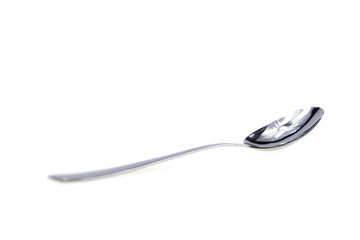 Silver spoon isolated on white background.