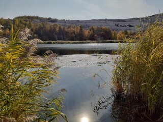 
lake in the forest in the Volskiy Cretaceous quarry, Saratov region, Russia