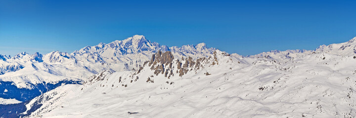 Panorama of the Mont Blanc in the French Alps, with snow and blue sky