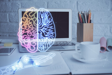 Double exposure of work space with computer and human brain drawing hologram. Brainstorm concept.