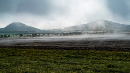 ceske stredohori hichlands in autumn morning fog