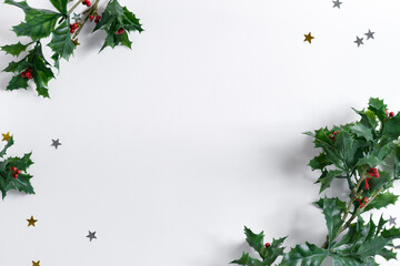 Corner Christmas frame decorated holiday holly leaves.