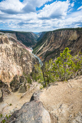 hiking the canyon rim south trail in grand canyon of the yellowstone, wyoming, usa