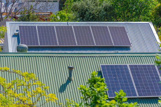 Solar Panels On Suburban House Roofs In Melbourne, Australia