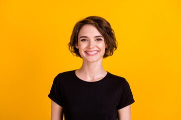 Close-up portrait of nice lovely content cheerful brown-haired girl wearing cotton tshirt isolated...