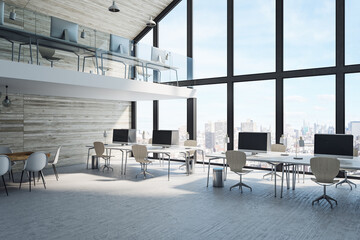 Contemporary loft office space with computers