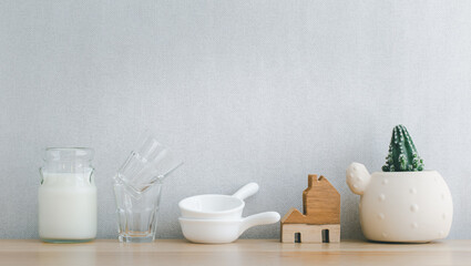 kitchenware decoration on wooden shelf with copy space