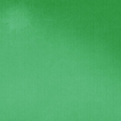 A green vintage rough sheet of carton. Recycled environmentally friendly cardboard paper texture. Simple and bright minimalist papercraft background.