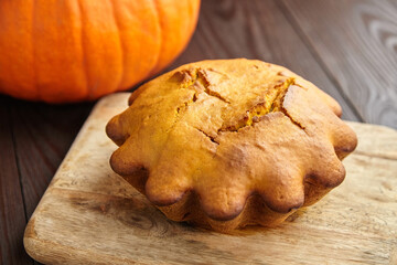 Pumpkin autumn cake on dark background