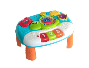 Developing children's  table-piano on a white background