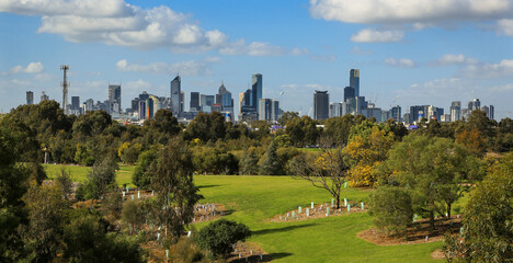 Skyline view across a park of the city of Melbourne in Victoria, Australia. 