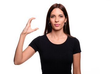 Isolated in white background brunette woman saying letter C  in spanish sign language