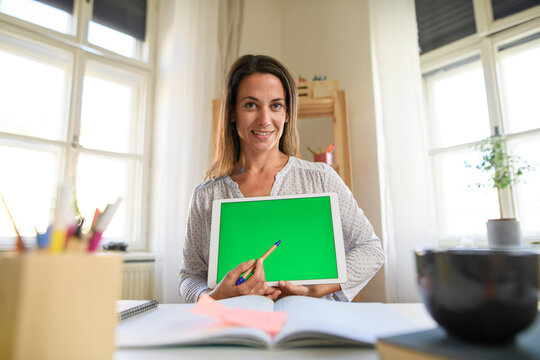 Woman teacher teaching online, coronavirus and keyable screen concept.