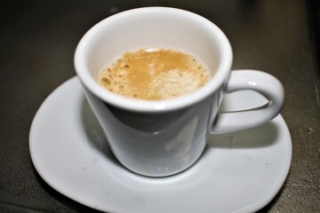 Sugar Dissolving in a Cup of Espresso