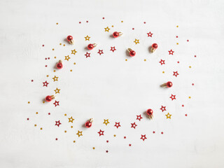 Christmas confetti and red balls frame
