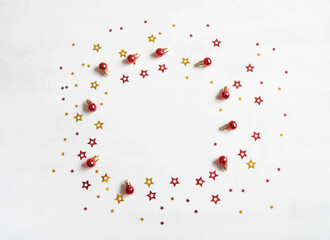 Christmas confetti and red balls frame