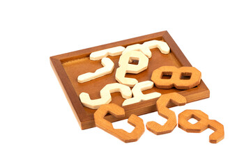 Disassembled 2D wooden puzzle Digital puzzle. Copy space.