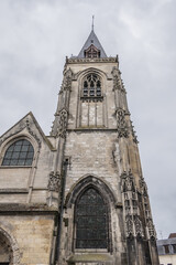 Fototapeta na wymiar Fragment of Amiens Church of Saint-Leu, dedicated to Bishop of Sens - Saint Leu. Built in 1481, church of Saint Leu is one of the twelve ancient Amiens parishes. Amiens, Somme, Picardie, France.